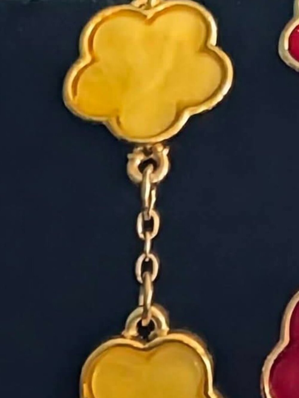 Yellow gold over stainless steel metallic clover bracelet